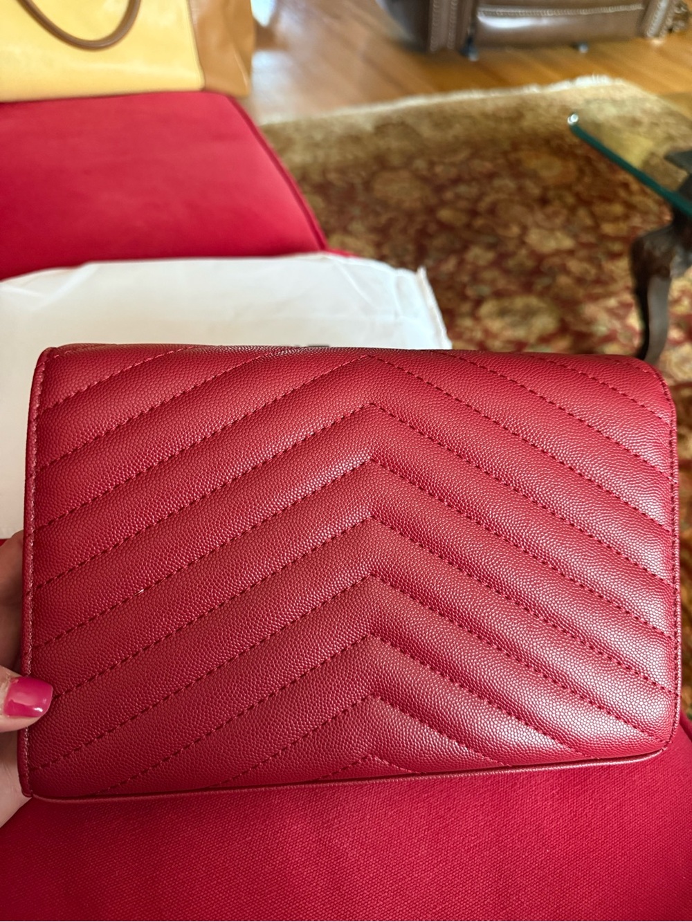 Yves Saint Lauren red leather clutch with gold chain. - Picture 2 of 7